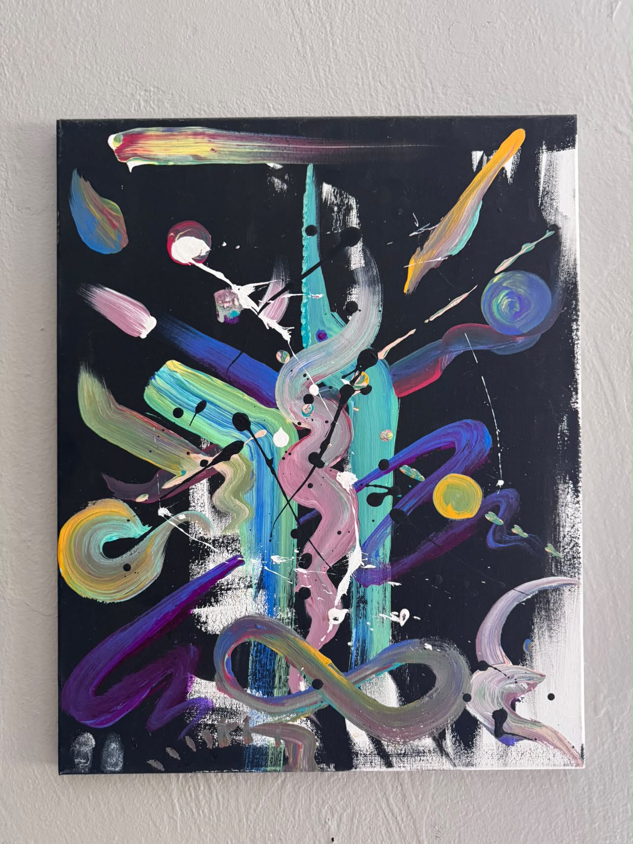 Sweeping brush marks in colour on black canvas